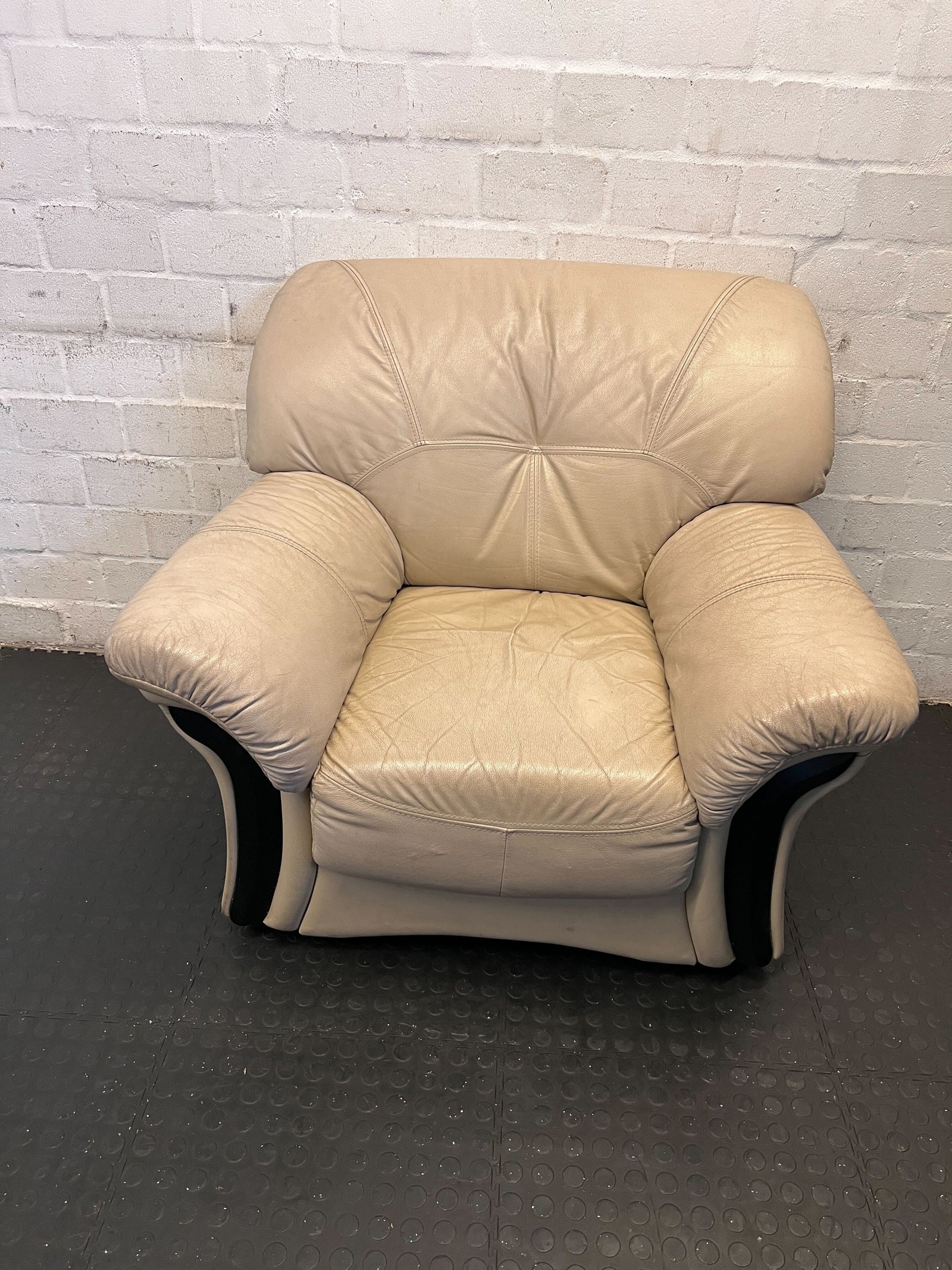 Cozy Cream Leather Armchair with Minor Wear