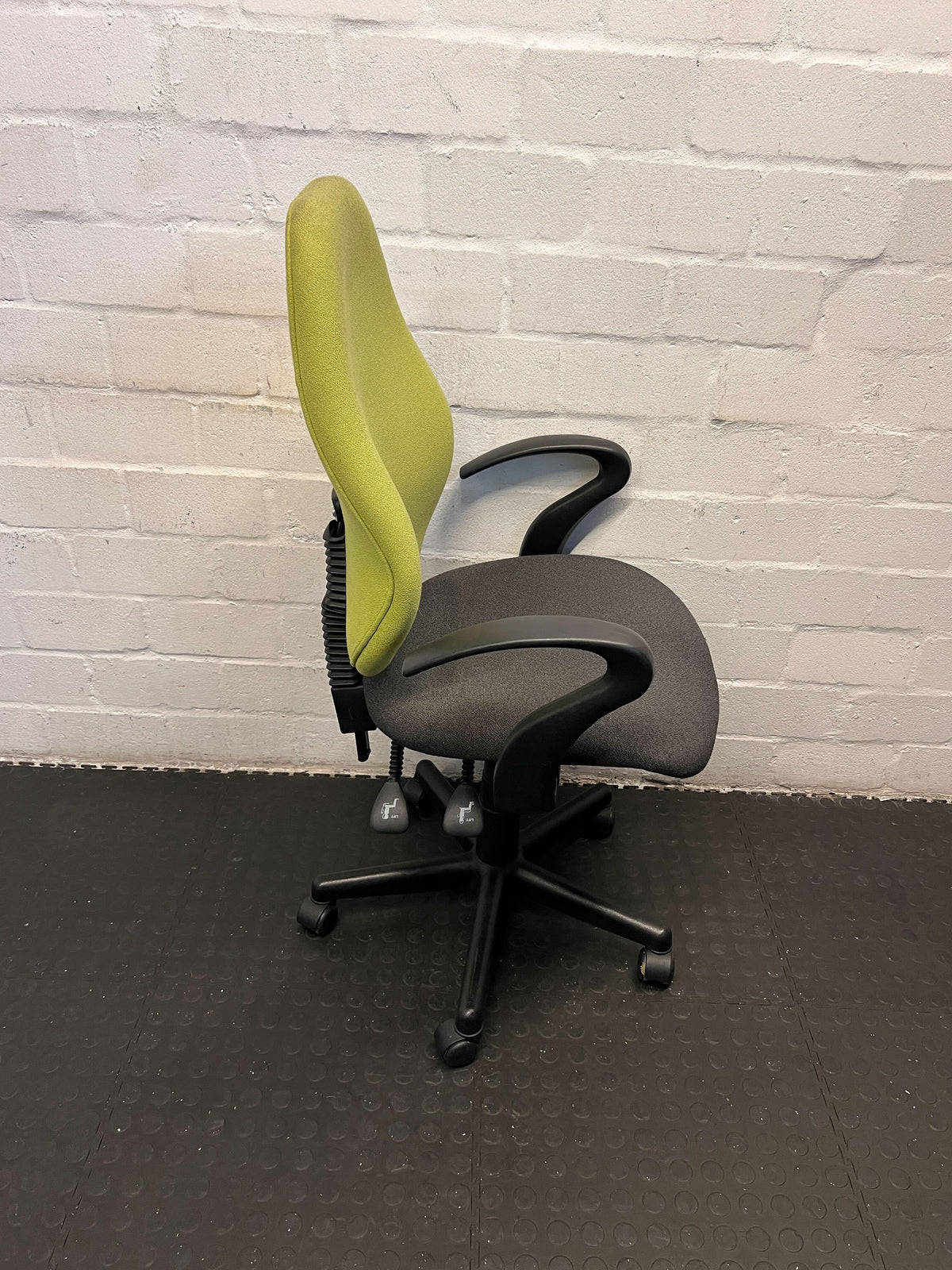 Ergonomic Green and Black Office Chair with Minor Wear