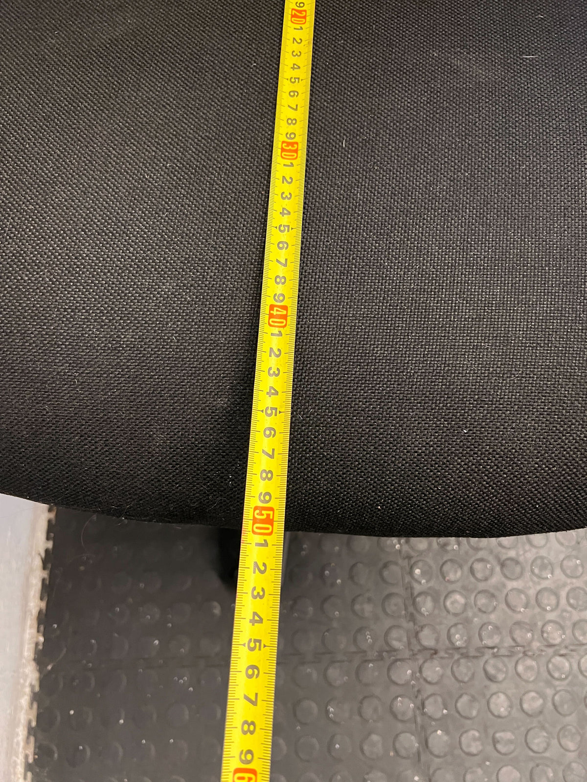 Ergonomic Black Fabric Office Chair with Minor Wear