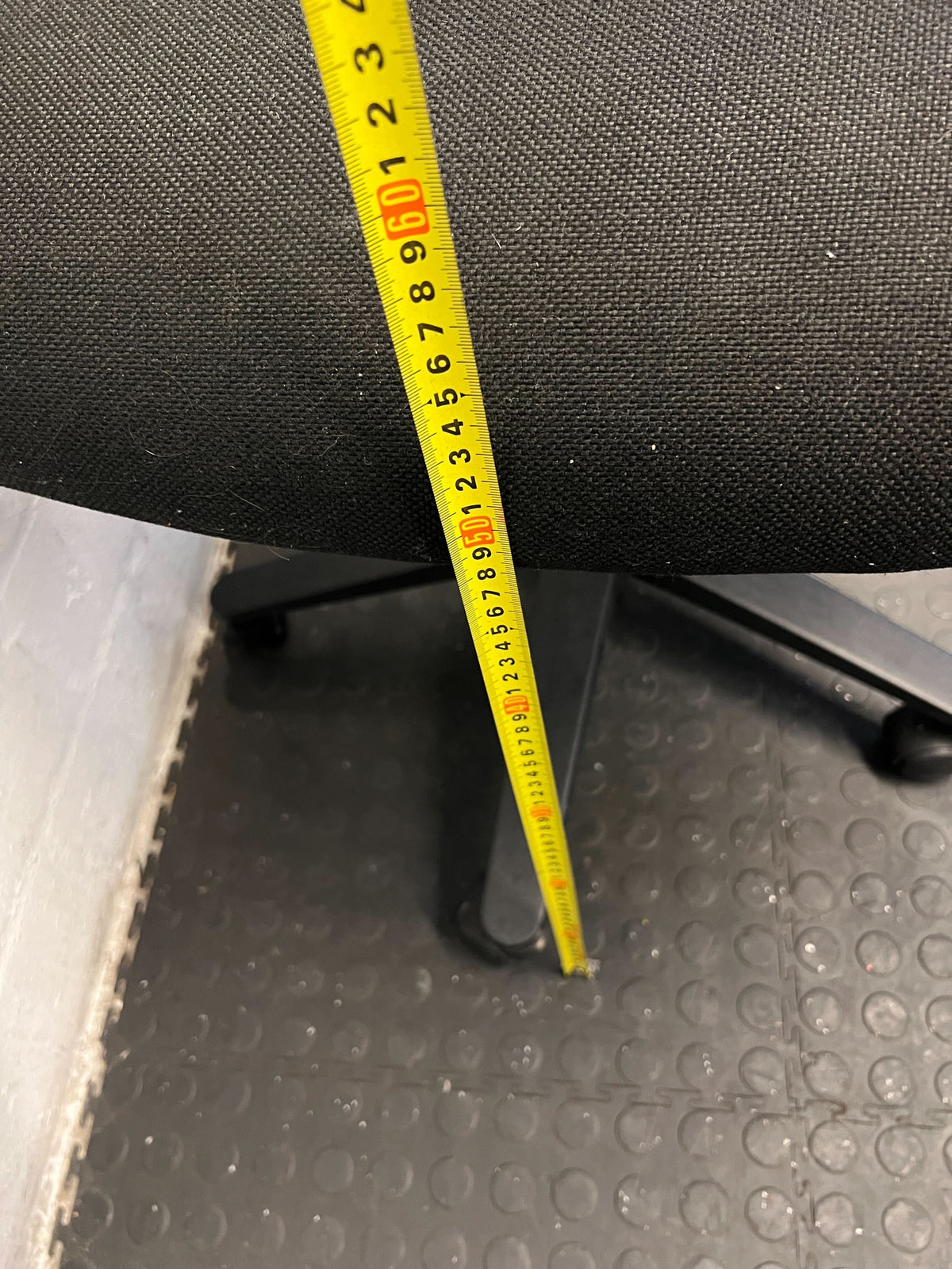 Ergonomic Black Fabric Office Chair with Minor Wear