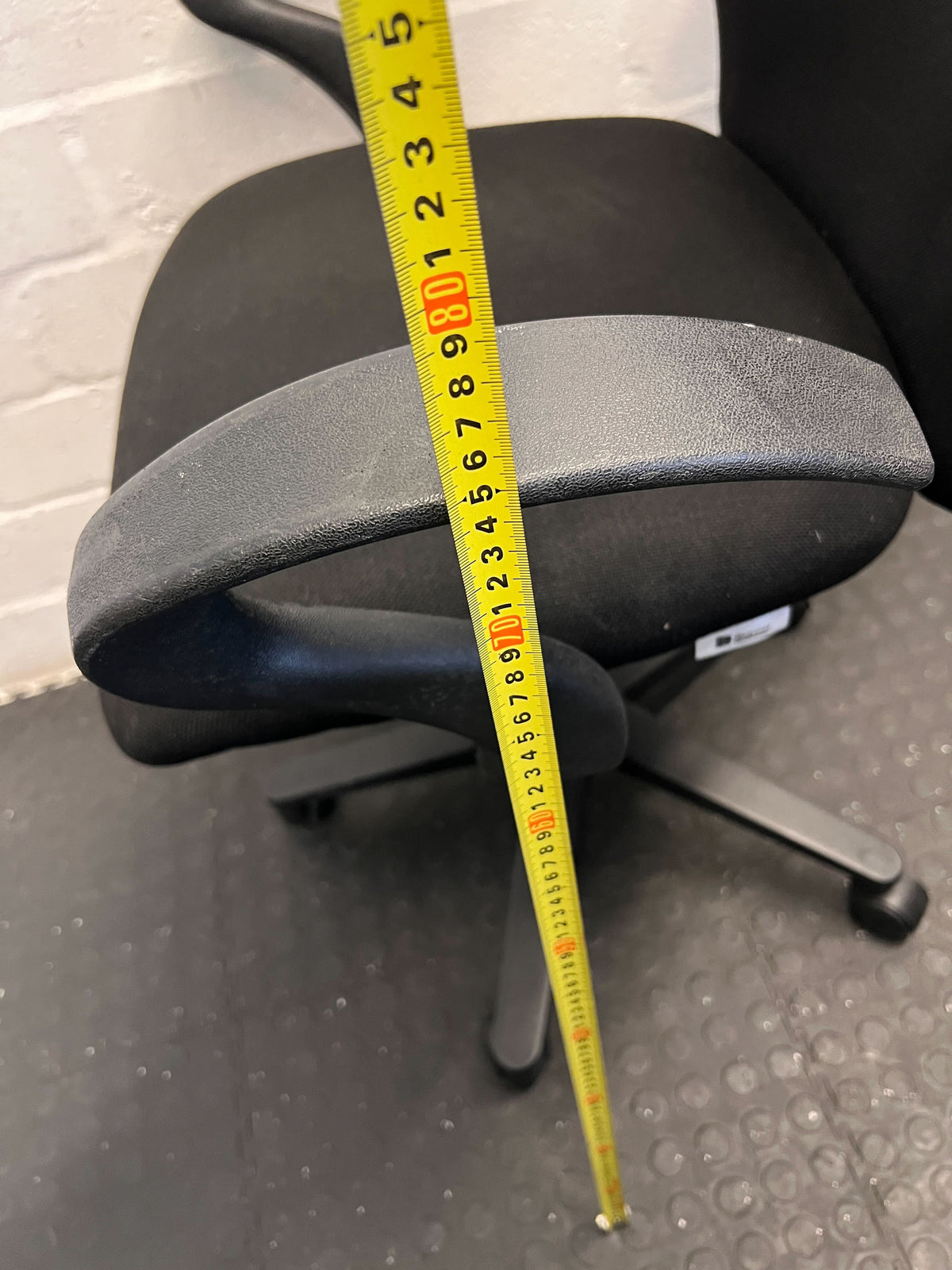 Ergonomic Black Fabric Office Chair with Minor Wear