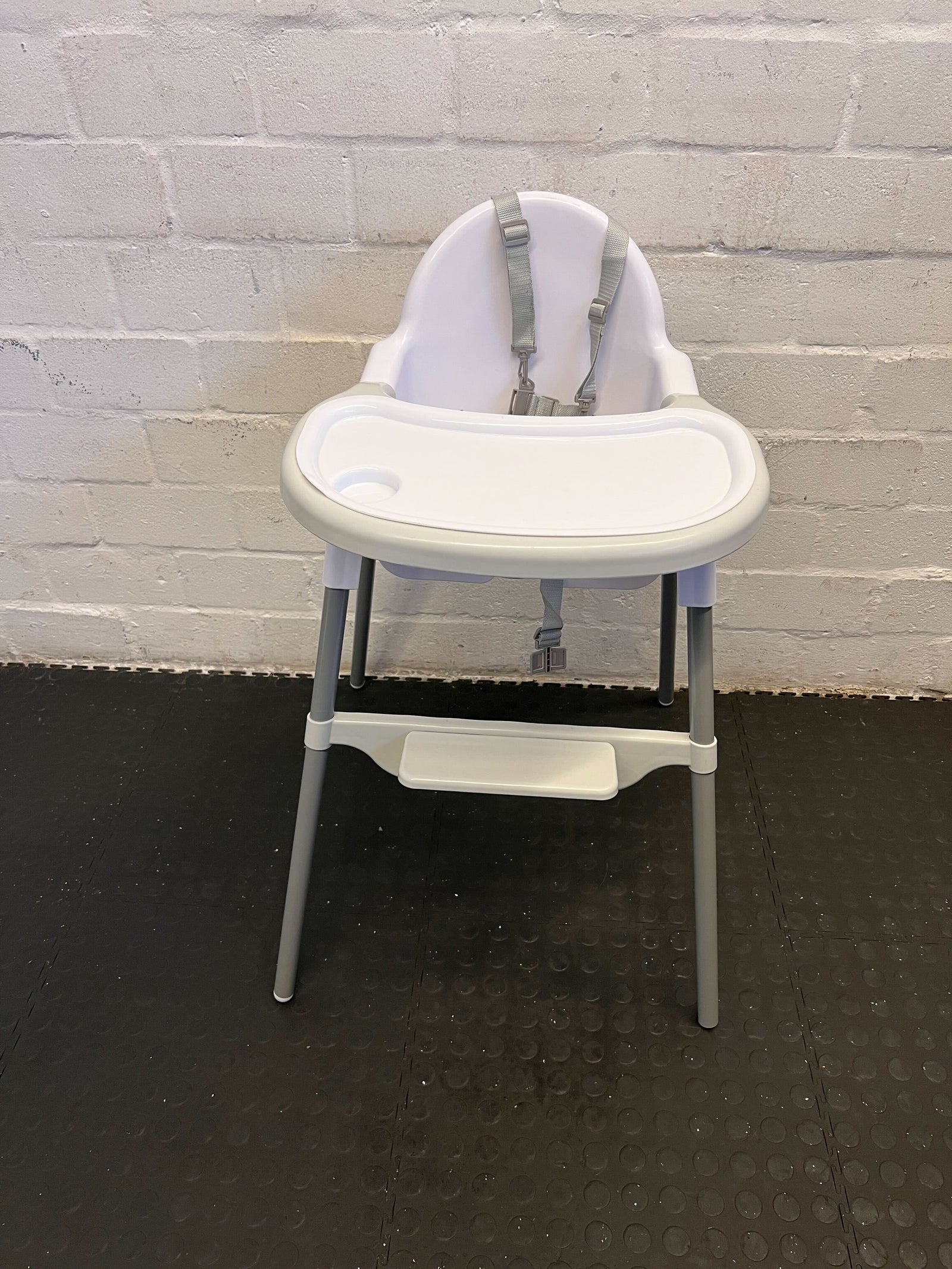 Compact White and Gray High Chair with Safety Harness