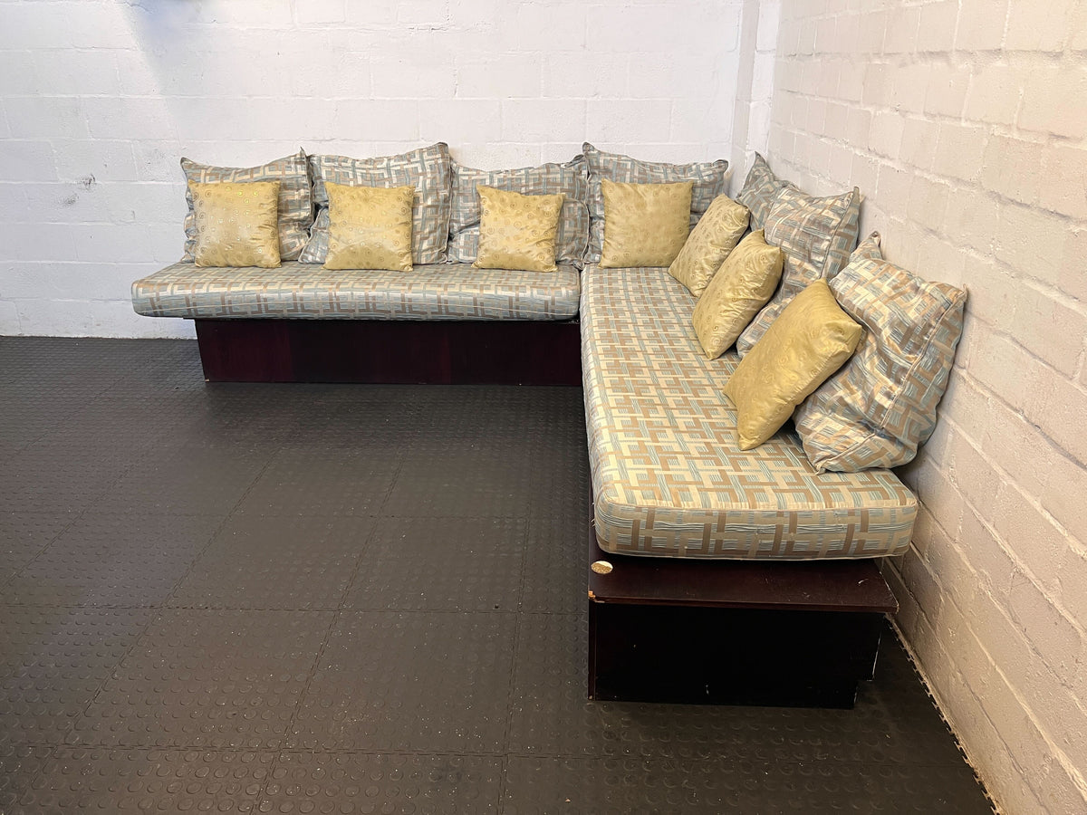 Elegant L-Shape Couch with Cushions in Light Blue and Yellow