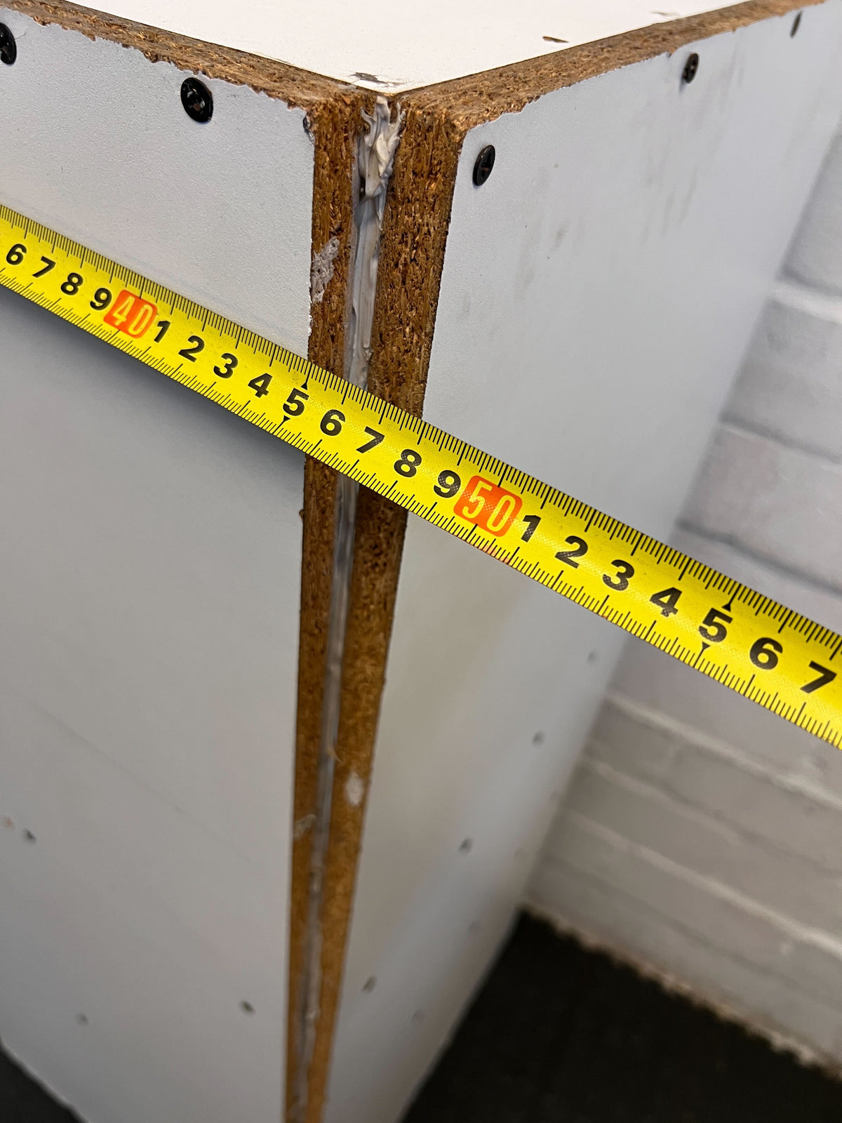 Minimalist White Wooden Bookshelf with Minor Edge Damage