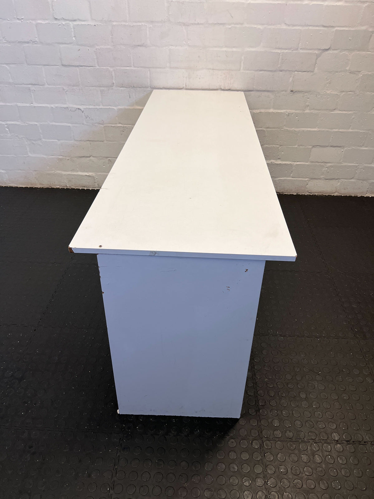 Spacious White Rectangular Desk with Minor Scratches