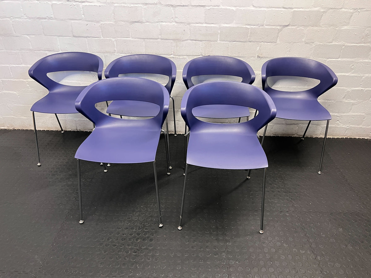 Gray fabric with a measuring tape showing measurements on a textured surface