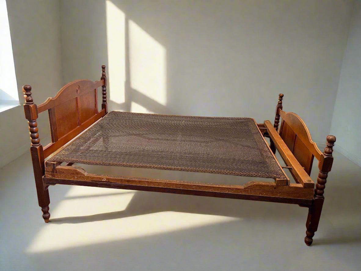 Vintage Wooden Double Bed Frame with Intricate Carving Details