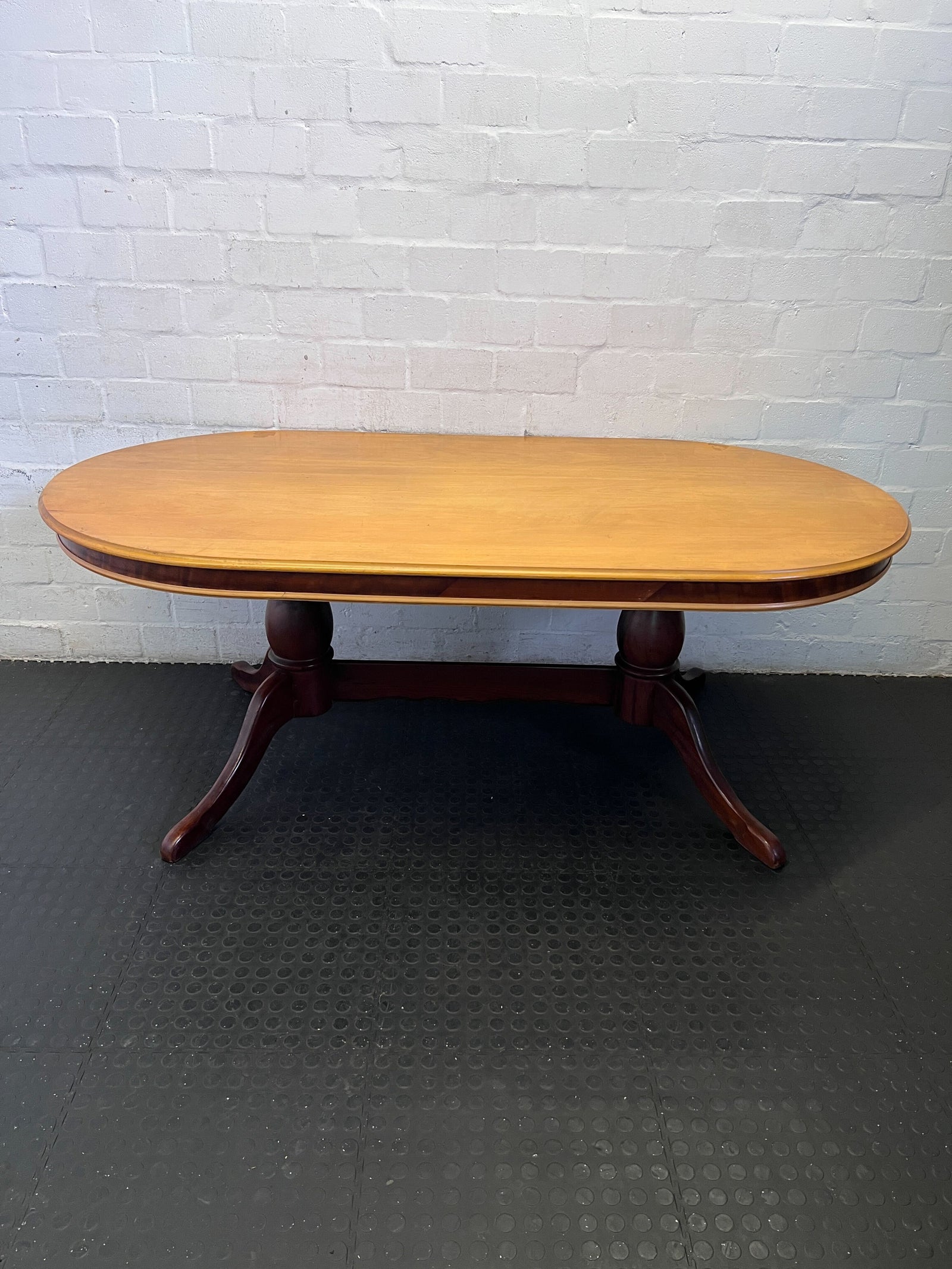 Elegant Wooden Oval Dining Table with Minor Scratches