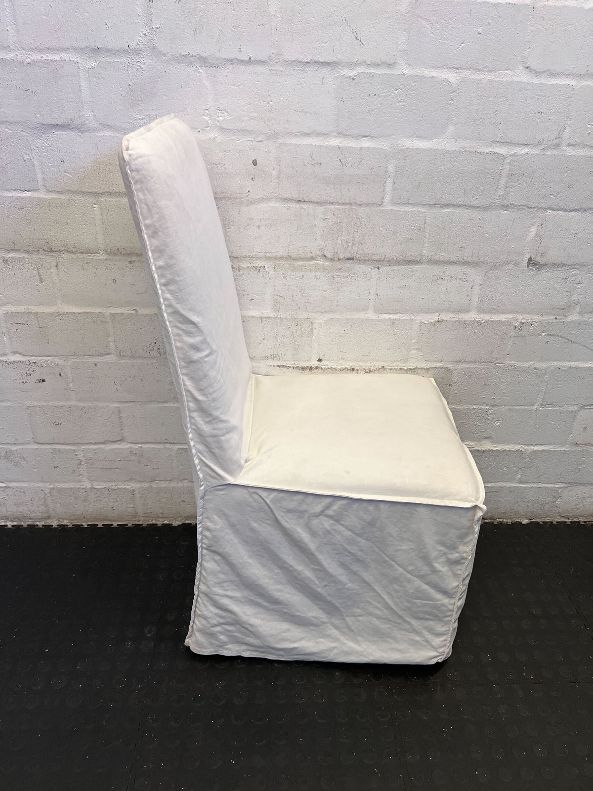 Elegant White Fabric Dining Chair with Minor Wear