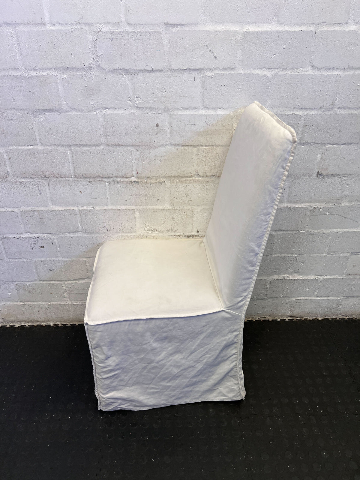 Elegant White Fabric Dining Chair with Minor Wear