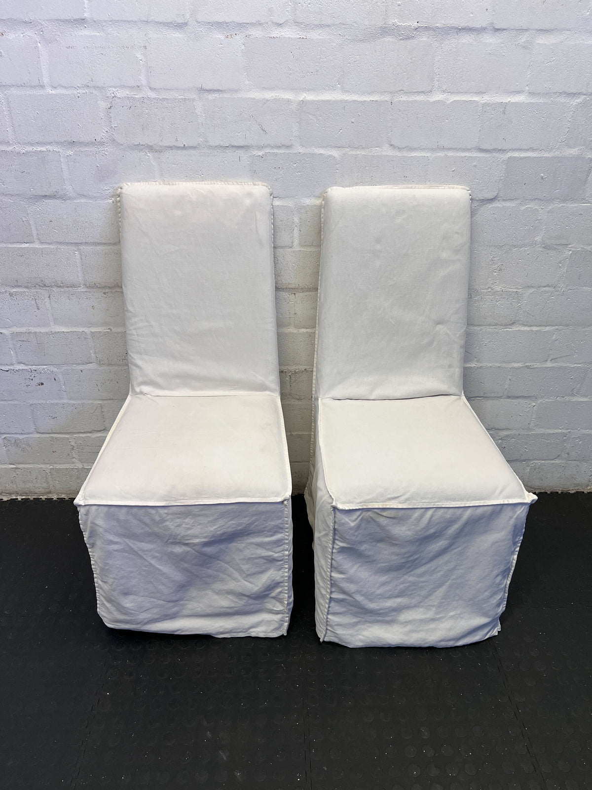 Elegant White Fabric Dining Chair with Minor Wear