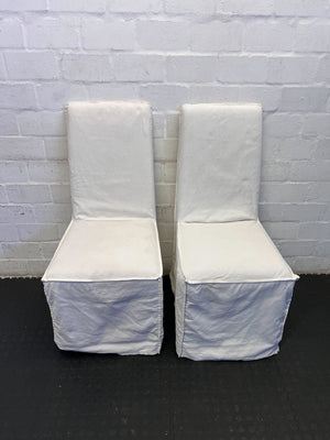 Elegant White Fabric Dining Chair with Minor Wear