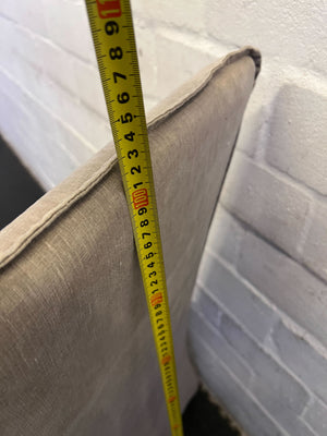 Stylish Beige Upholstered Dining Chair with Minor Wear