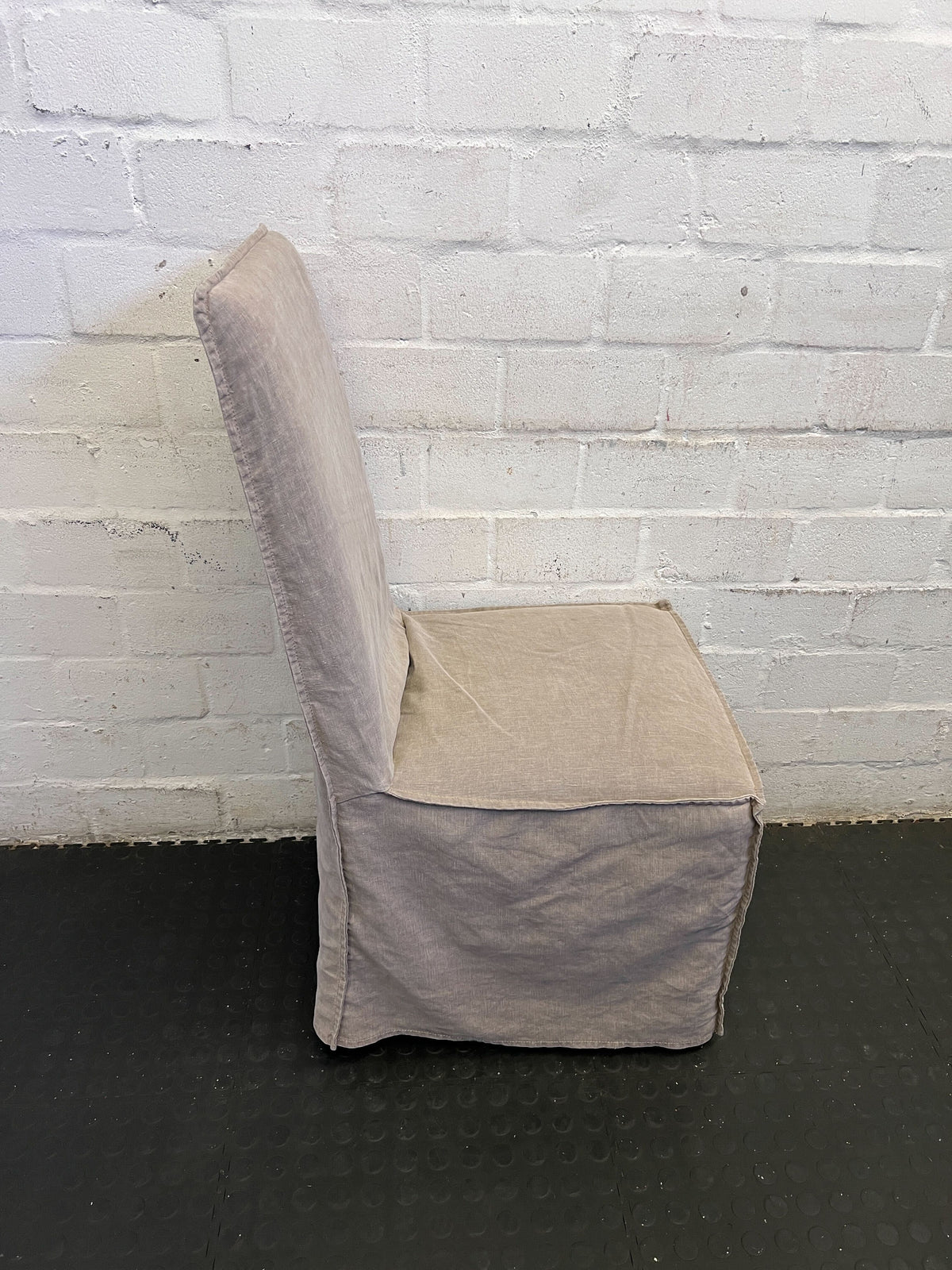 Stylish Beige Upholstered Dining Chair with Minor Wear