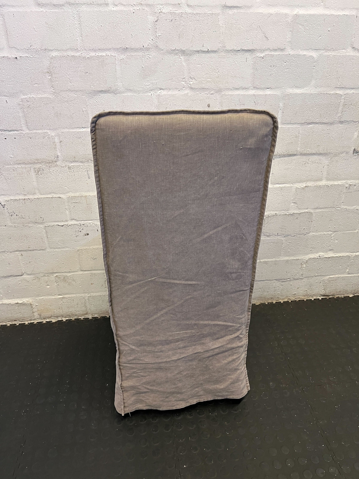 Stylish Beige Upholstered Dining Chair with Minor Wear