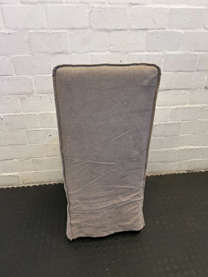 Stylish Beige Upholstered Dining Chair with Minor Wear