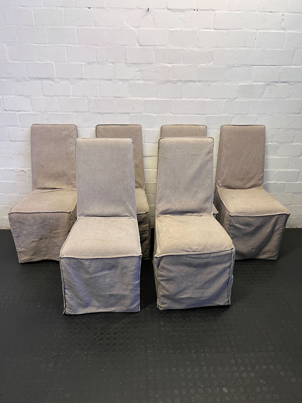 Stylish Beige Upholstered Dining Chair with Minor Wear