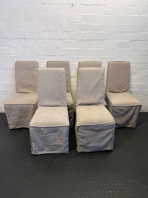 Stylish Beige Upholstered Dining Chair with Minor Wear