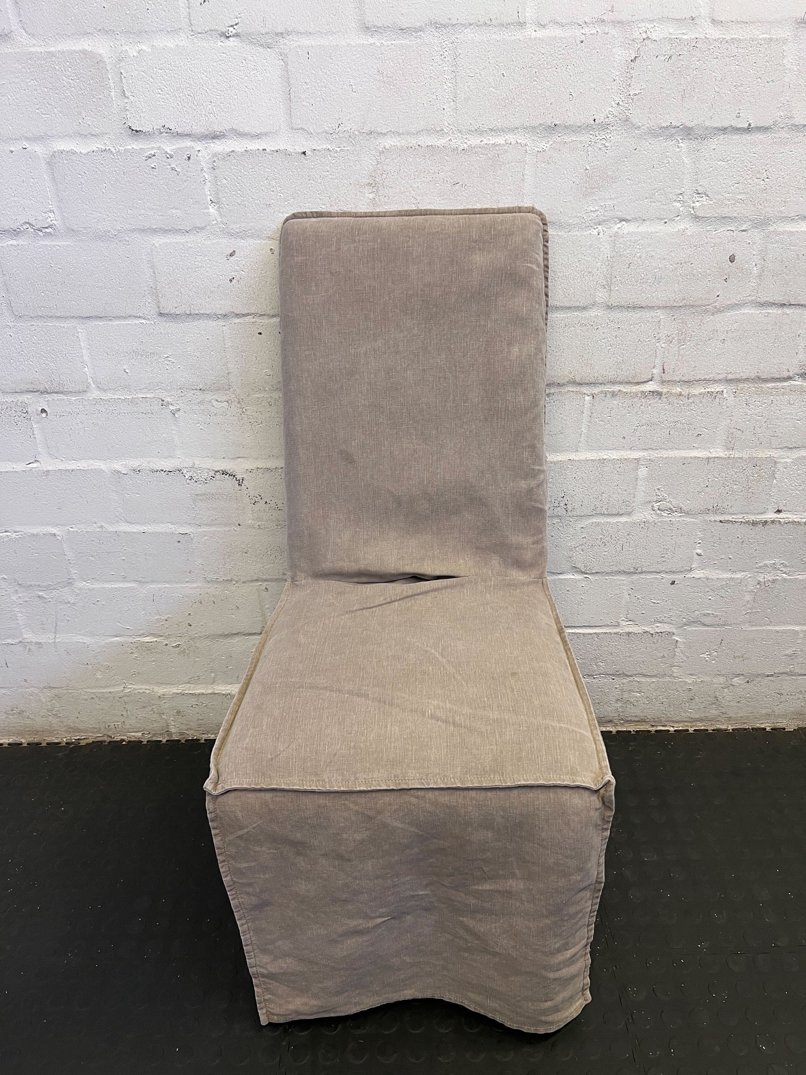 Stylish Beige Upholstered Dining Chair with Minor Wear
