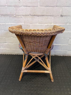 Charming Vintage Wicker Chair with Colorful Cushion