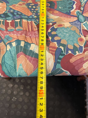 Charming Vintage Wicker Chair with Colorful Cushion