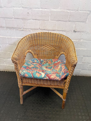 Charming Vintage Wicker Chair with Colorful Cushion