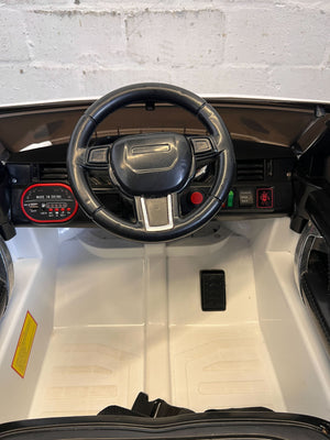 Pre-Loved White Ride-On Toy Car - Kids' Electric Adventure - Has No Remote Battery needs replacement