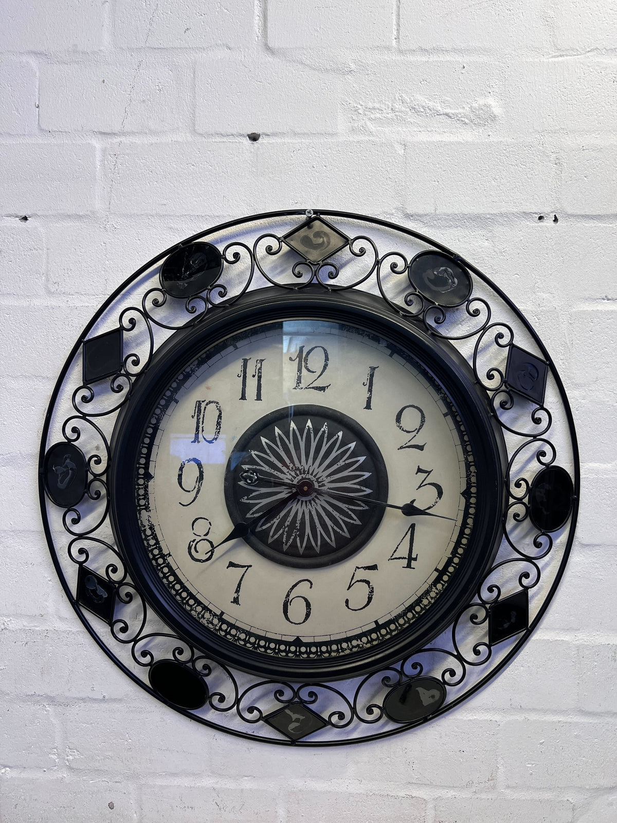 Ornate Black Metal Wall Clock - Vintage Charm