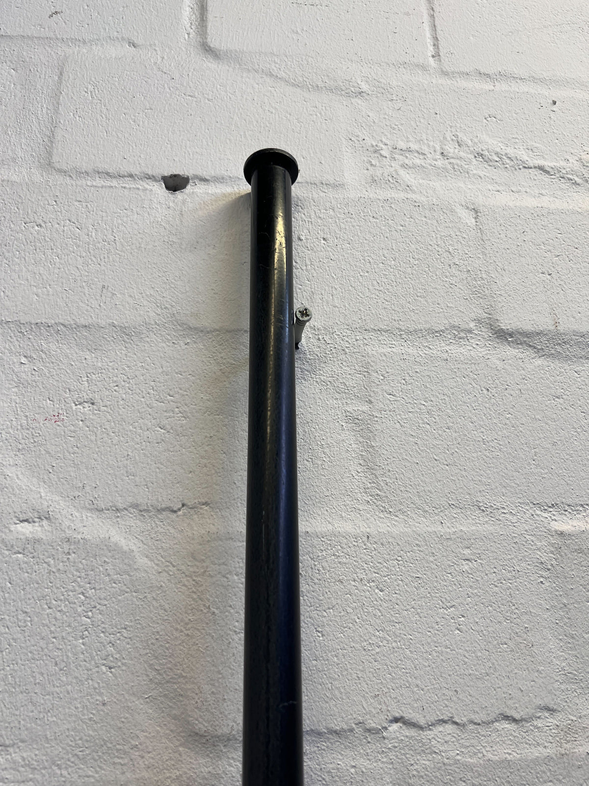 Sleek Black Wooden and Metal Wall-Mounted Railing