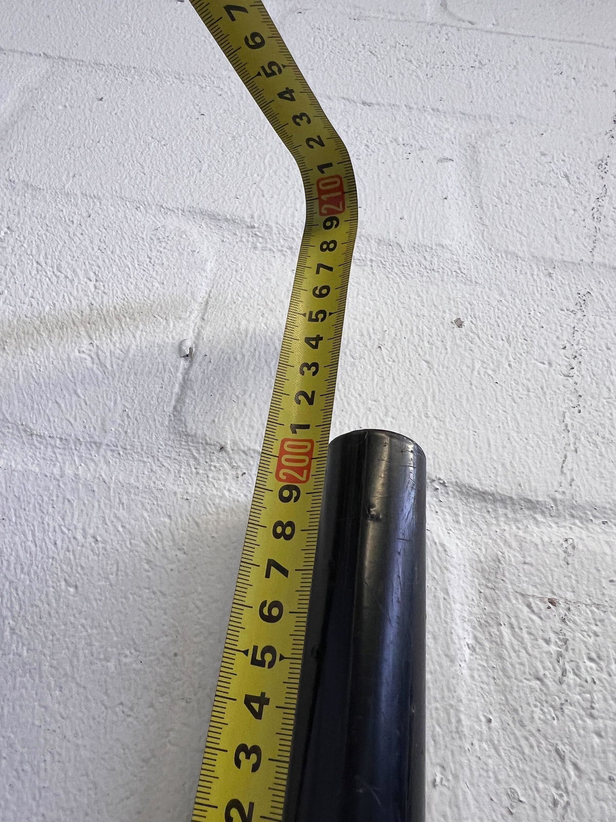 Sleek Black Wooden and Metal Wall-Mounted Railing