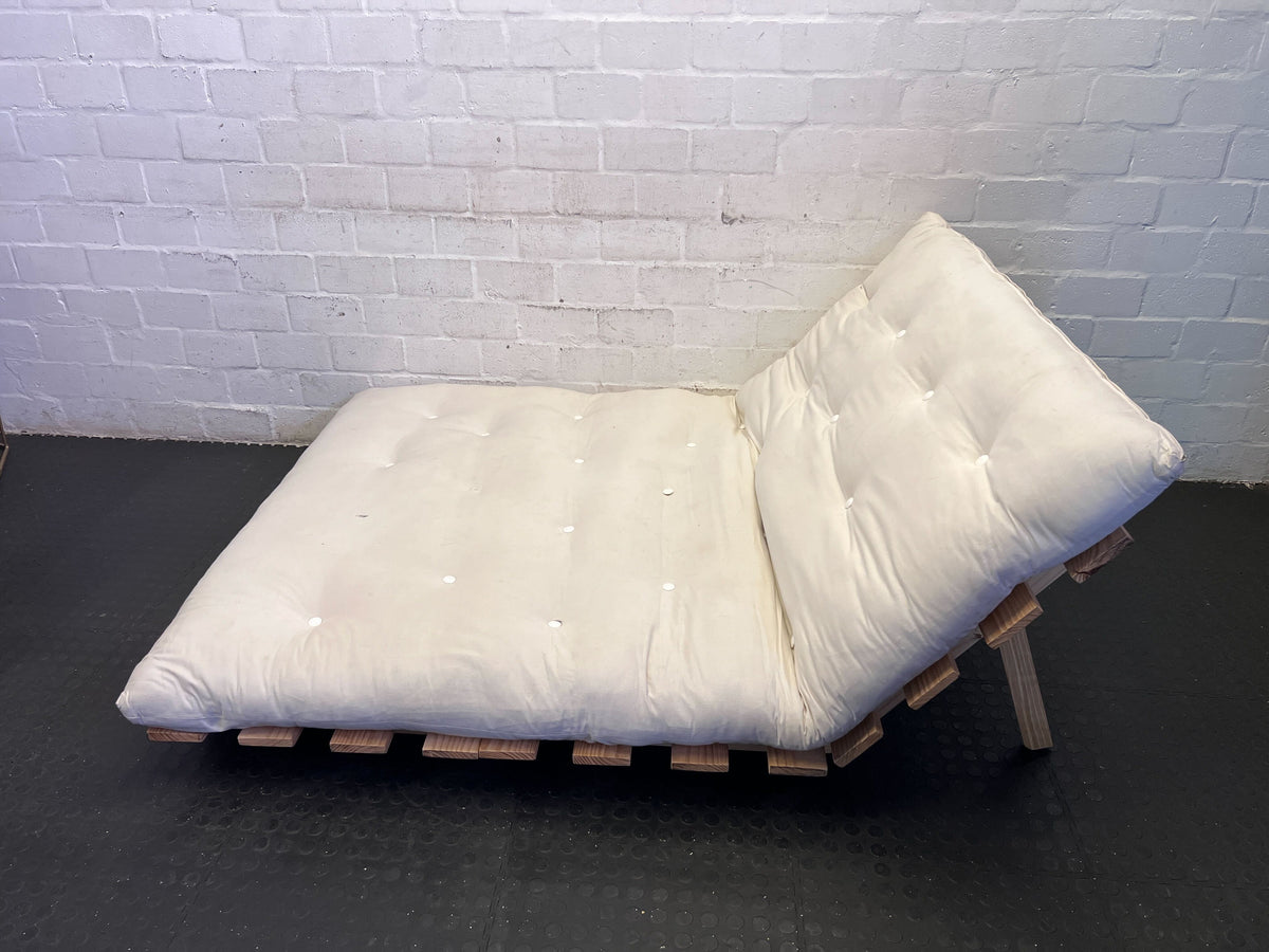 Versatile Cream Futon Mattress with Wooden Base