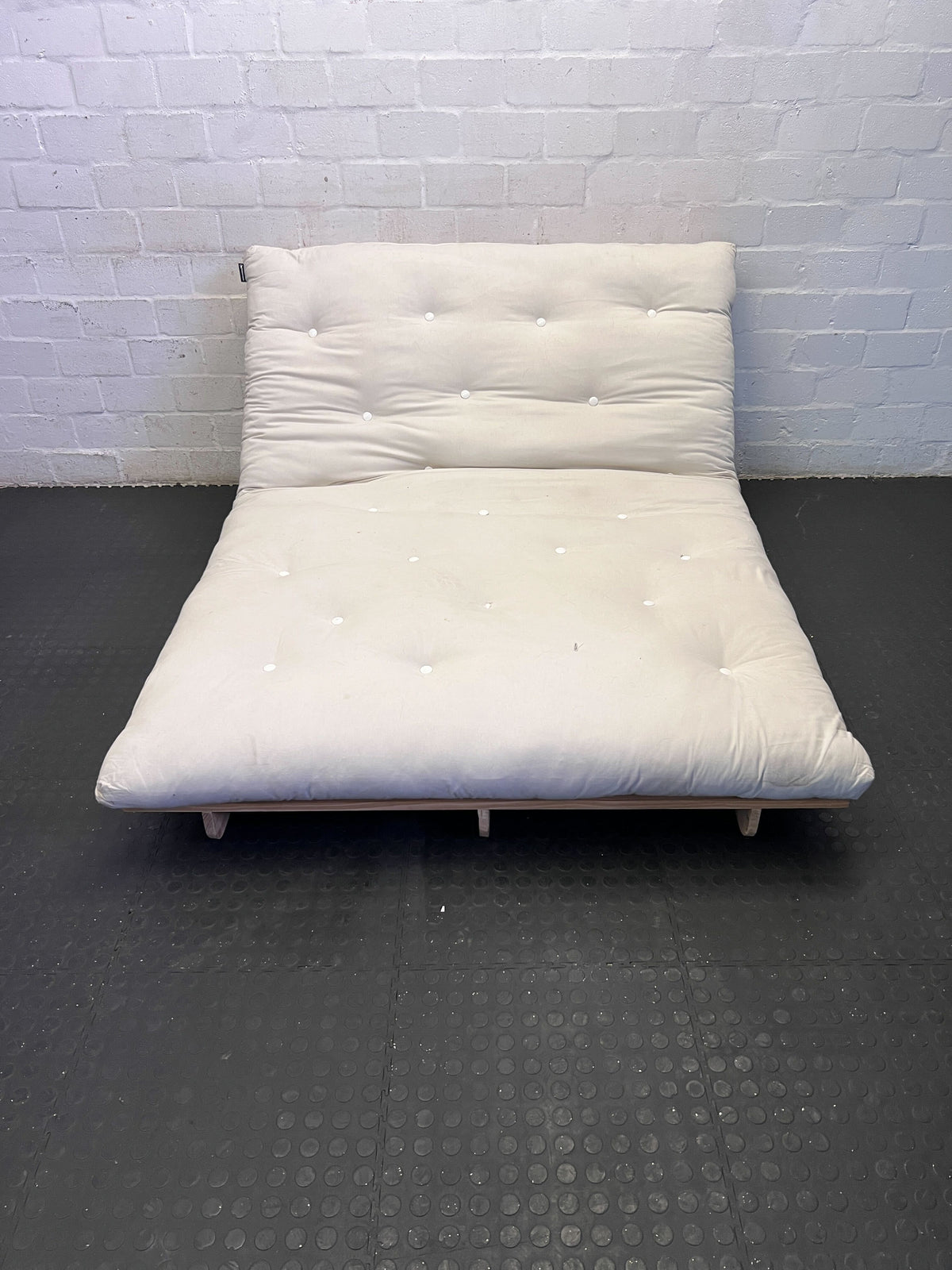 Versatile Cream Futon Mattress with Wooden Base