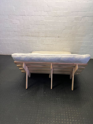 Versatile Cream Futon Mattress with Wooden Base