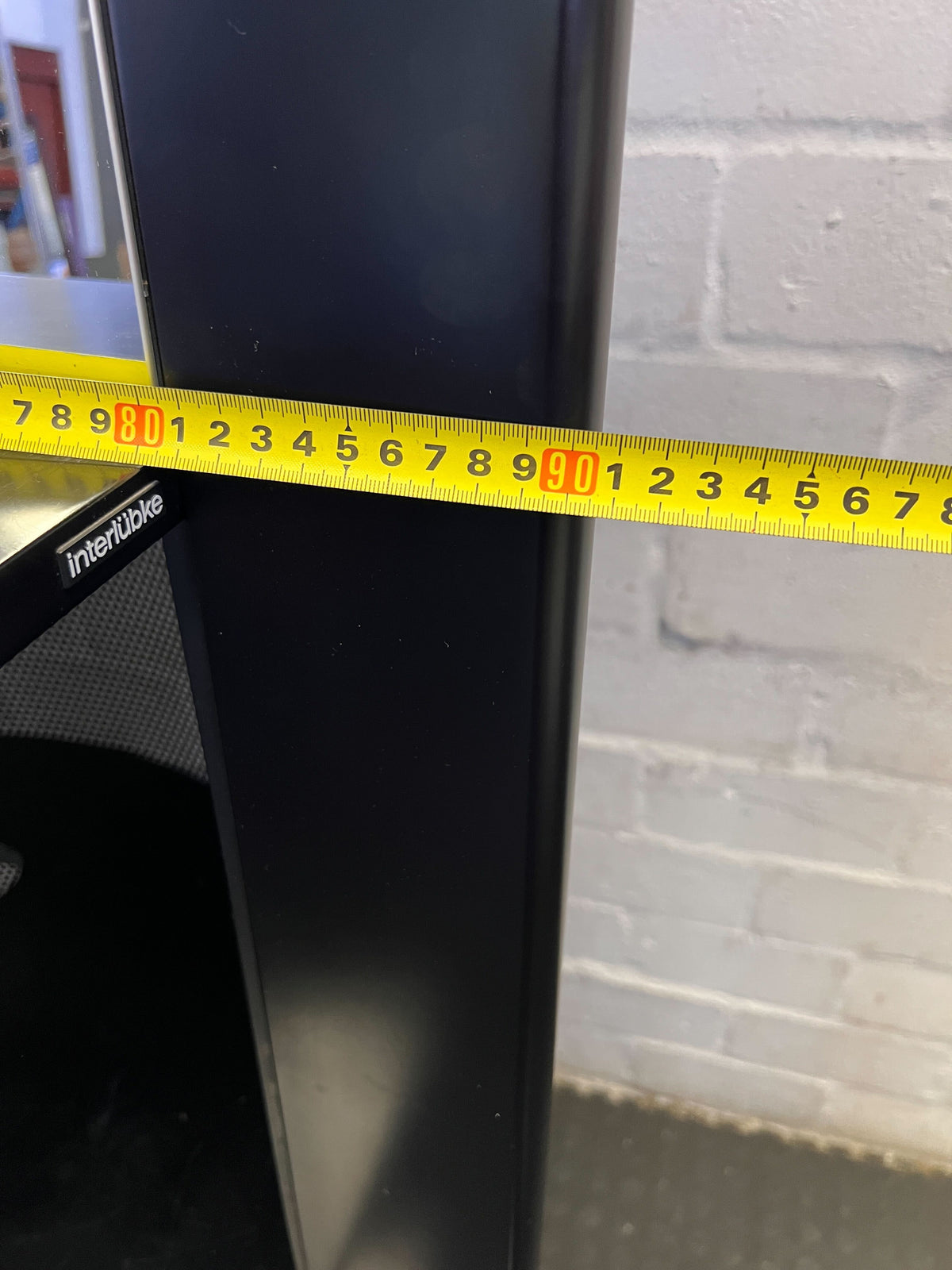 Sleek Black Mirrored Display Unit with Shelves & Drawer