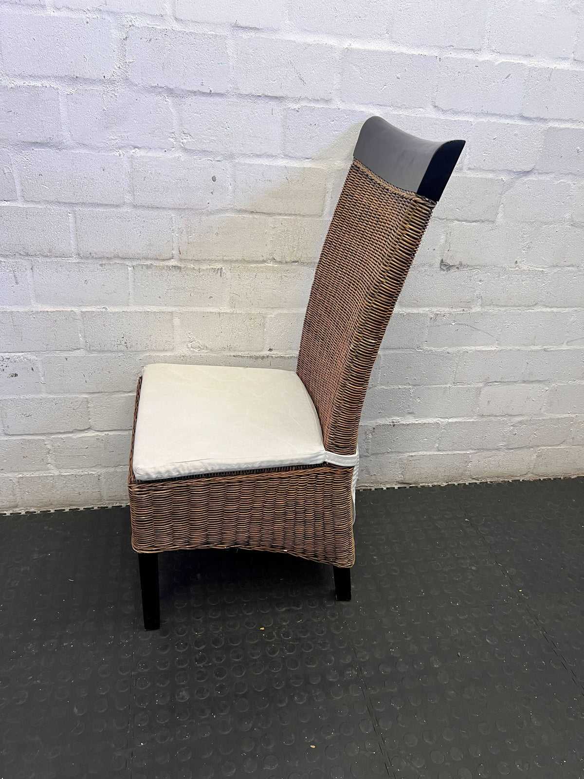 Charming Wicker Dining Chair with Cream Cushion