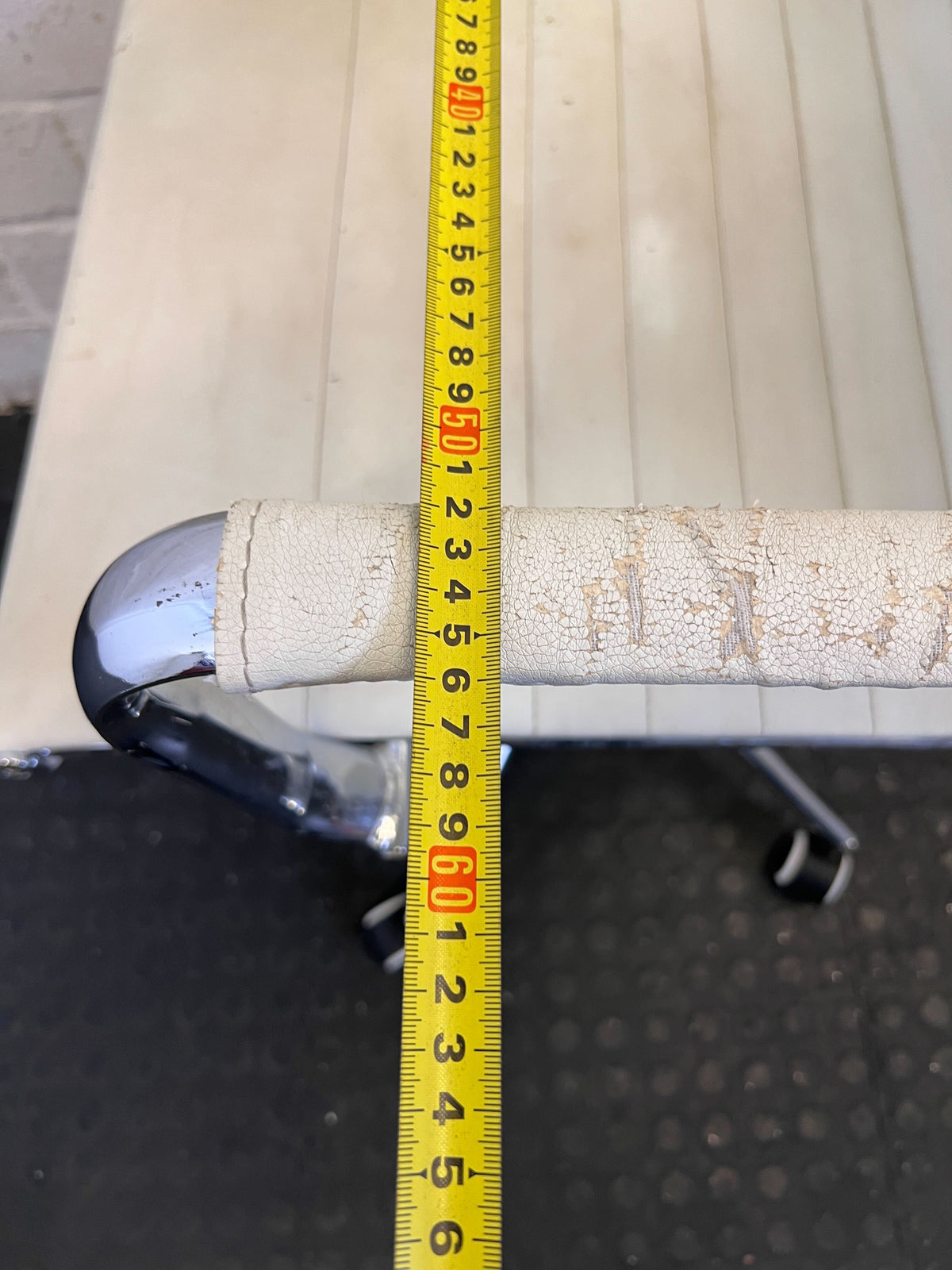 Sleek Cream Ribbed Swivel Office Chair