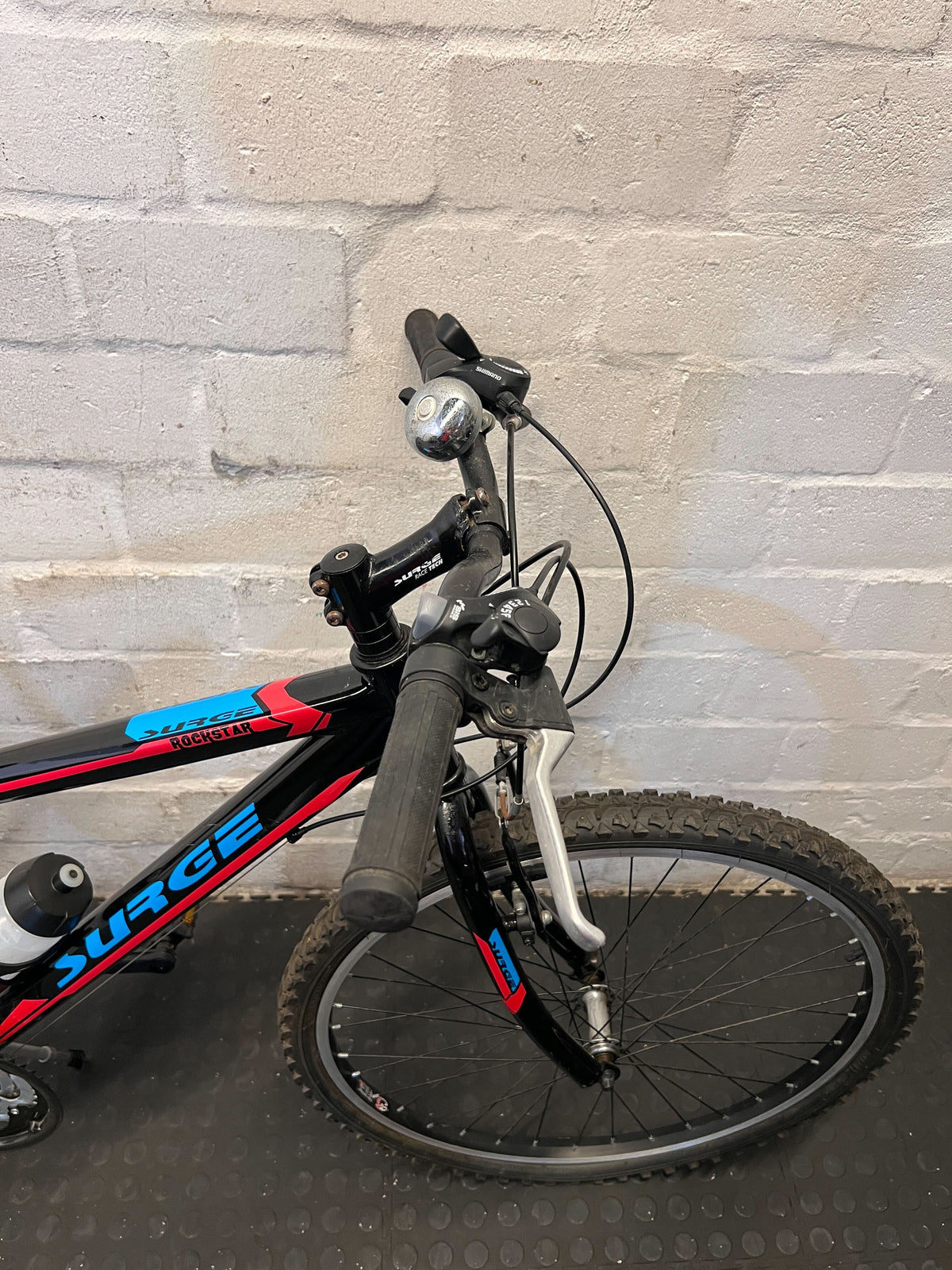 SURGE Mountain Bike - Black, Red & Blue with Bottle Holder - 2ndhandwarehouse.com