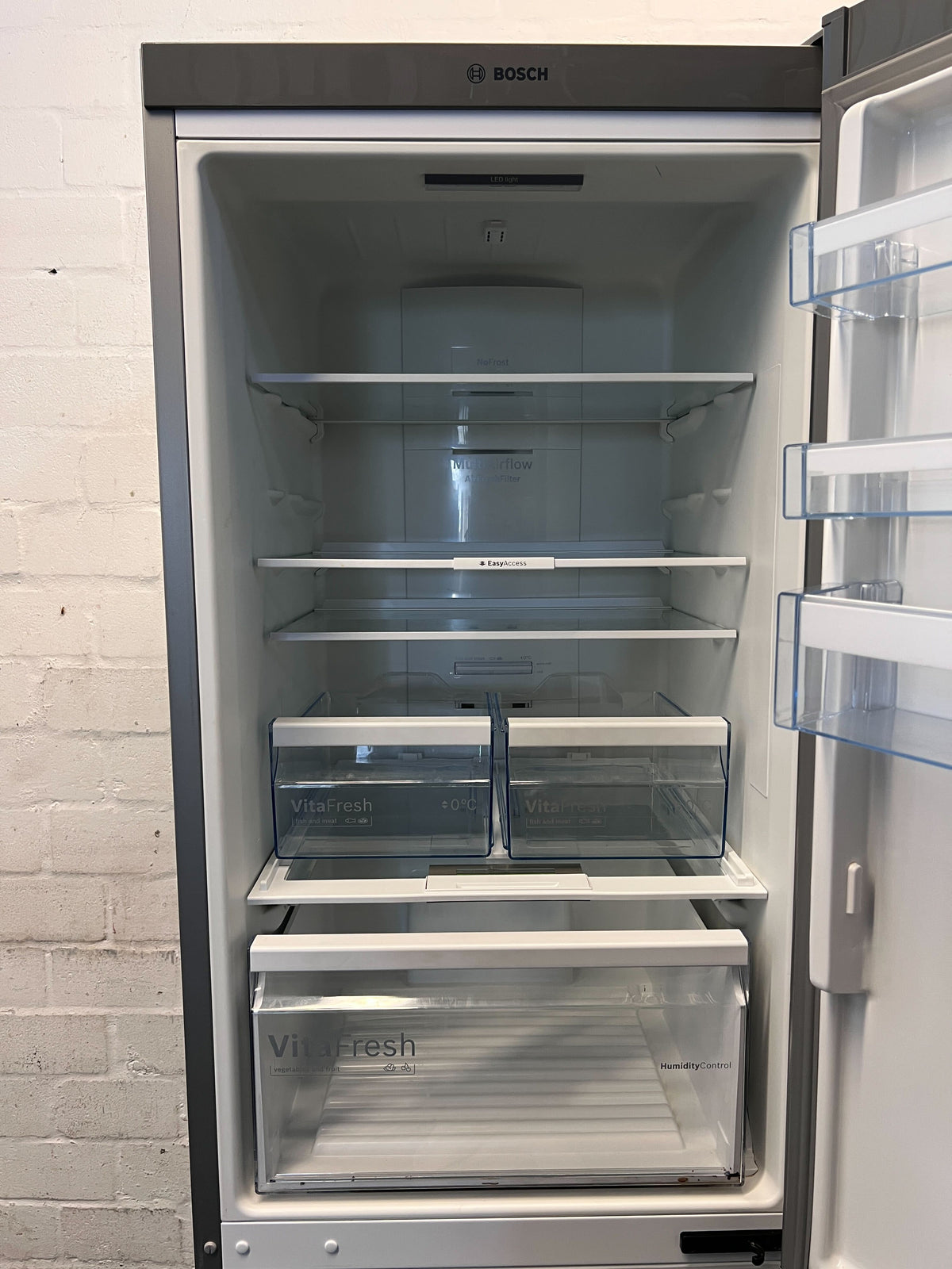 Sleek Stainless Steel Fridge-Freezer Combo - 2ndhandwarehouse.com