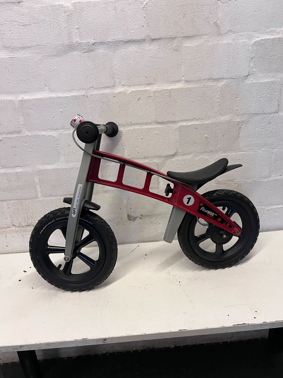 Pre-Loved FirstBIKE Red Balance Bike - Ready for Adventures! - 2ndhandwarehouse.com