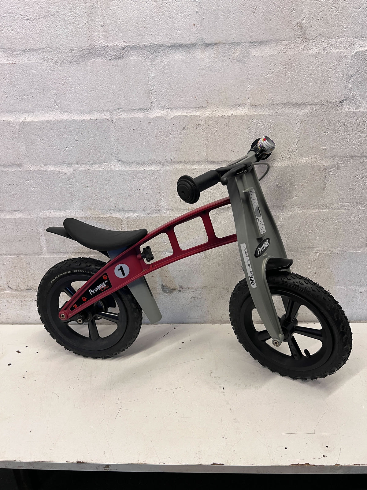Pre-Loved FirstBIKE Red Balance Bike - Ready for Adventures! - 2ndhandwarehouse.com