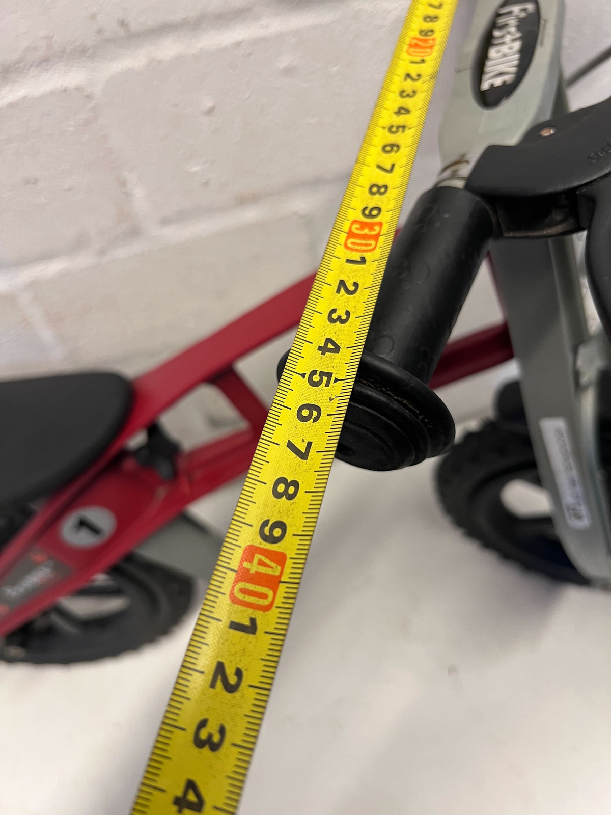 Pre-Loved FirstBIKE Red Balance Bike - Ready for Adventures! - 2ndhandwarehouse.com