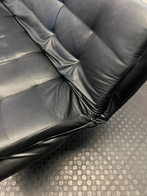 Versatile Black Faux Leather Futon Sofa Bed with Gold Accents - Broken one side - 2ndhandwarehouse.com