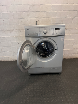 LG 7kg Front Loader Washing Machine in Silver — Good Working Order with Minor Scratches - 2ndhandwarehouse.com