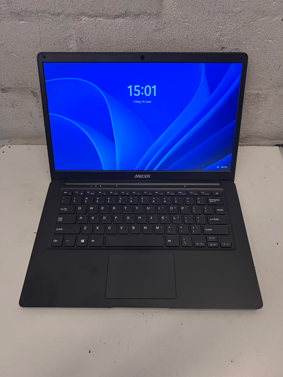 Sleek Black Mecer Laptop — Good Working Order