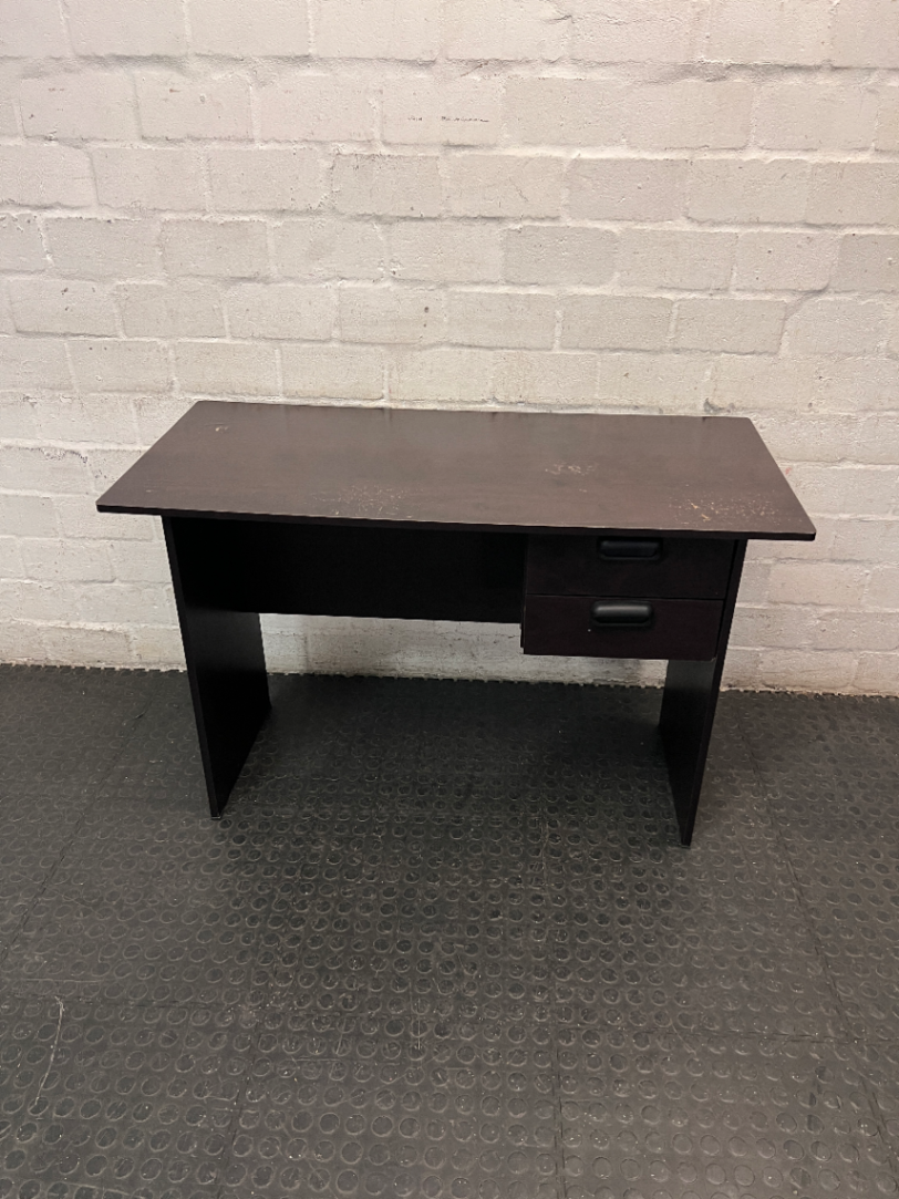 Black Compact Office Desk with Two Drawers — Visible Surface Wear
