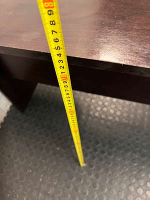 Black Compact Office Desk with Two Drawers — Visible Surface Wear