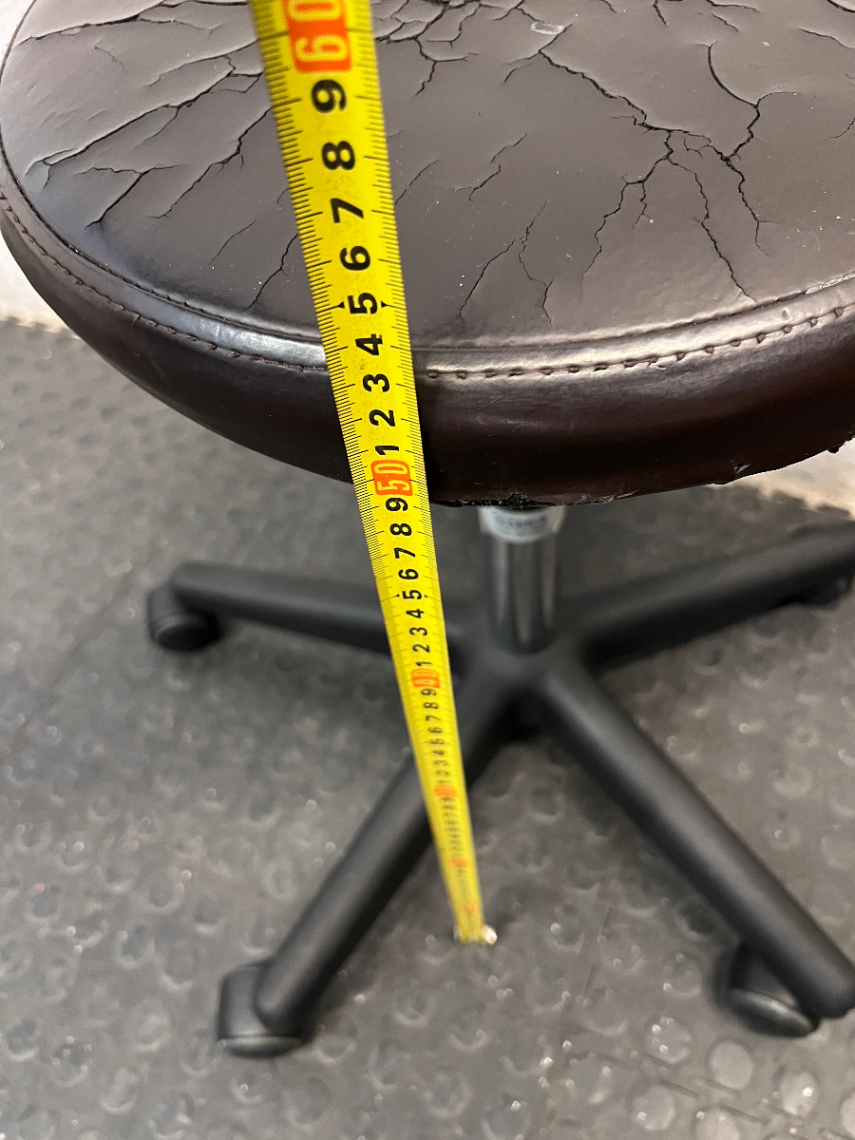 Adjustable Swivel Stool with Castors in Brown — Cracked and Peeling Seat Surface