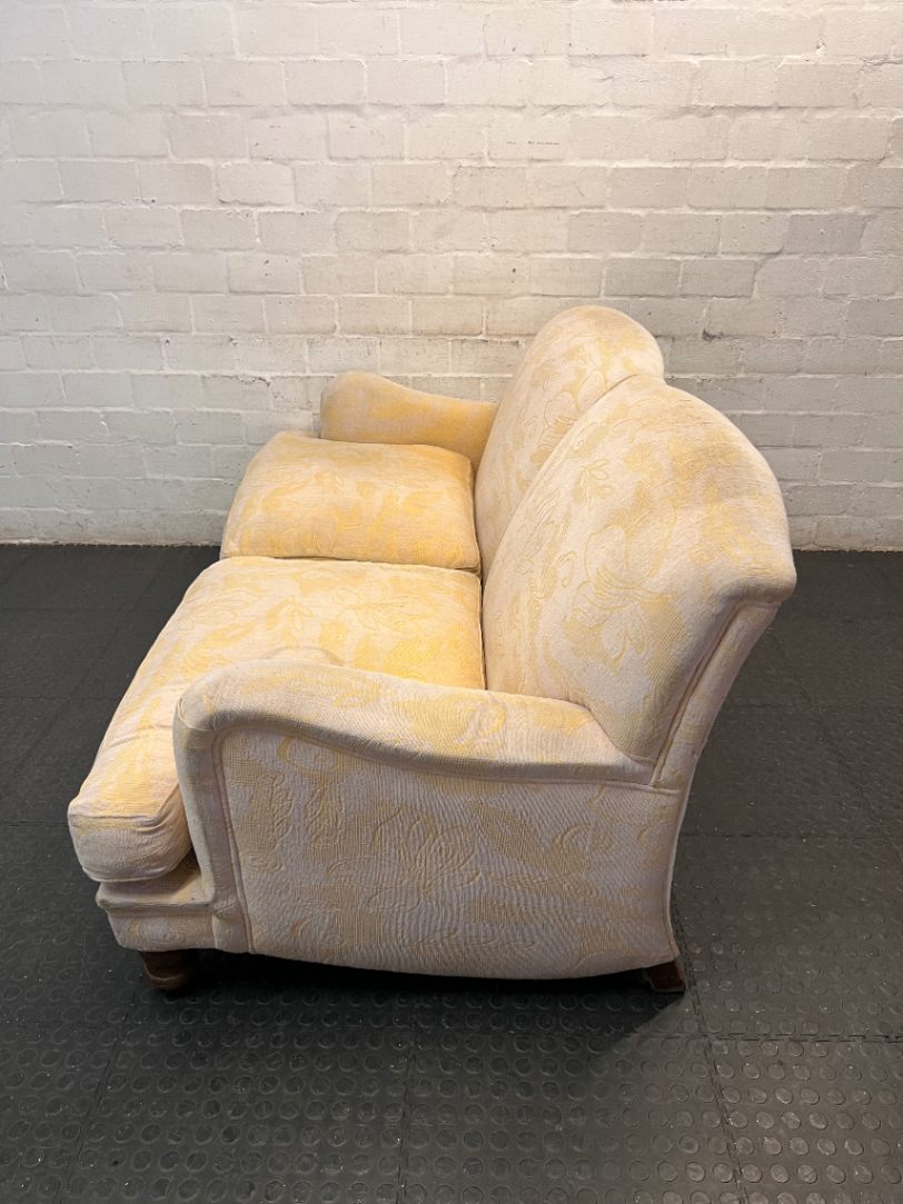 Beige Floral Patterned 2 Seater Couch with Wooden Feet — Fair Condition with General Wear