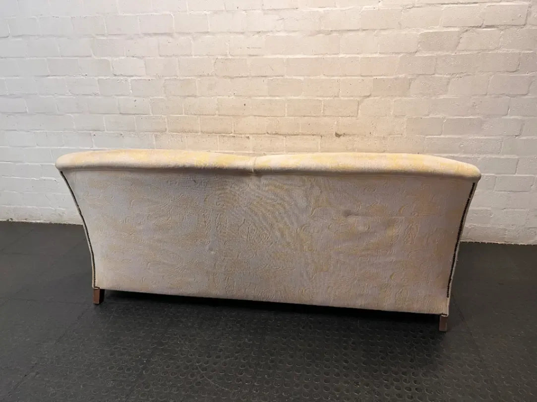 Beige Floral Patterned 2 Seater Couch with Wooden Feet — Fair Condition with General Wear
