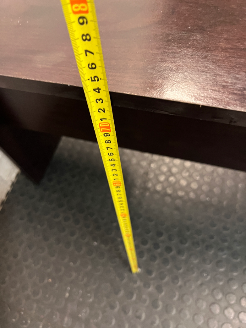 Black Compact Office Desk with Two Drawers — Visible Surface Wear